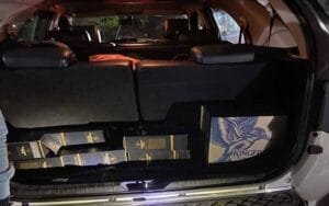 Liquor bottles recovered from Delhi number car at Bahral barrier, case registered against driver