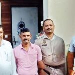 नालागढ़ में संपत्ति फ्रीज करने की कार्रवाई करती बद्दी पुलिस